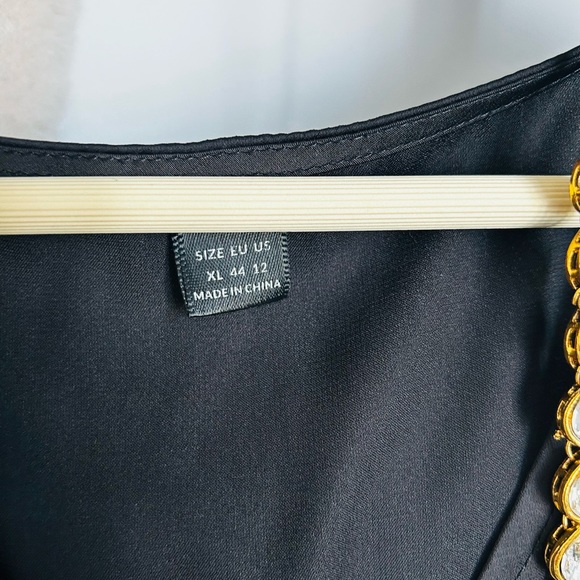 Gently used black satin dress. - Picture 2 of 2